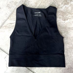 Garage cropped black V neck ribbed tank. Size XS.
